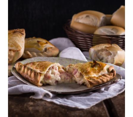 EMPANADA DE JAMON Y QUESO AL HORNO X UND